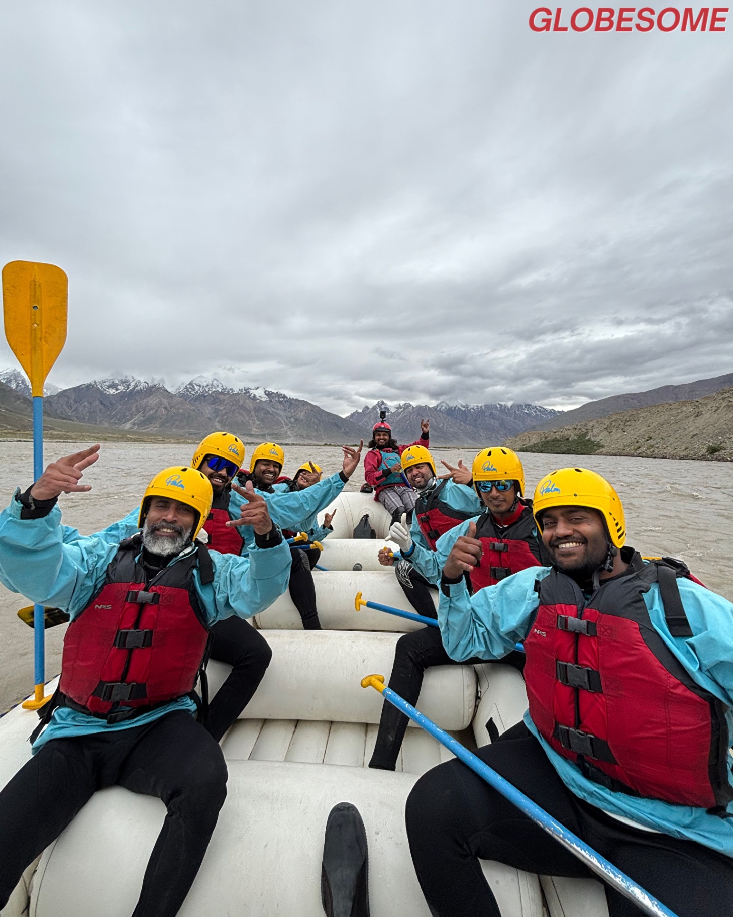 Full boat, all smiles - heading downstream