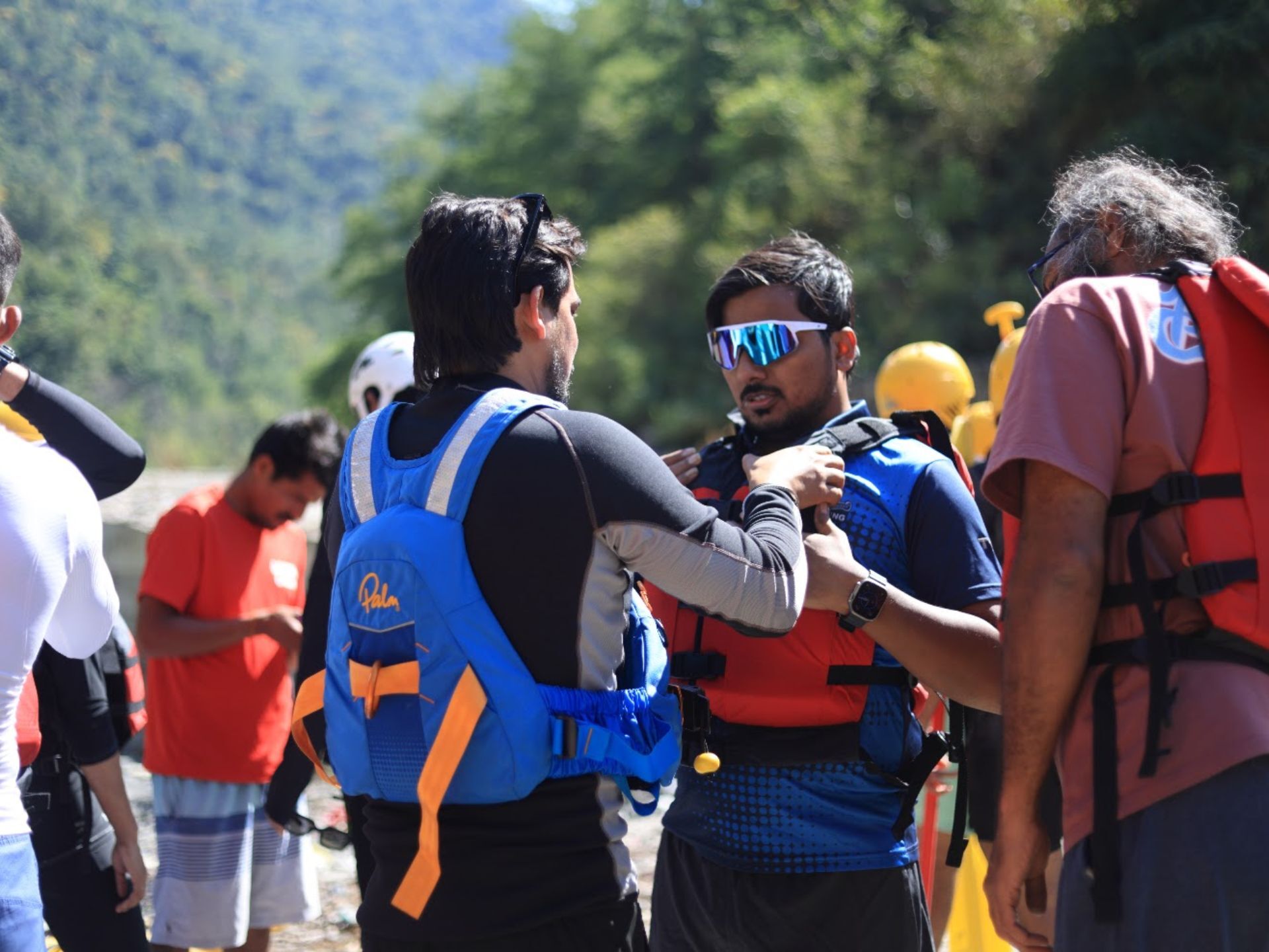 Rafters getting fitted with life jackets and helmets before the 36 KM rafting day