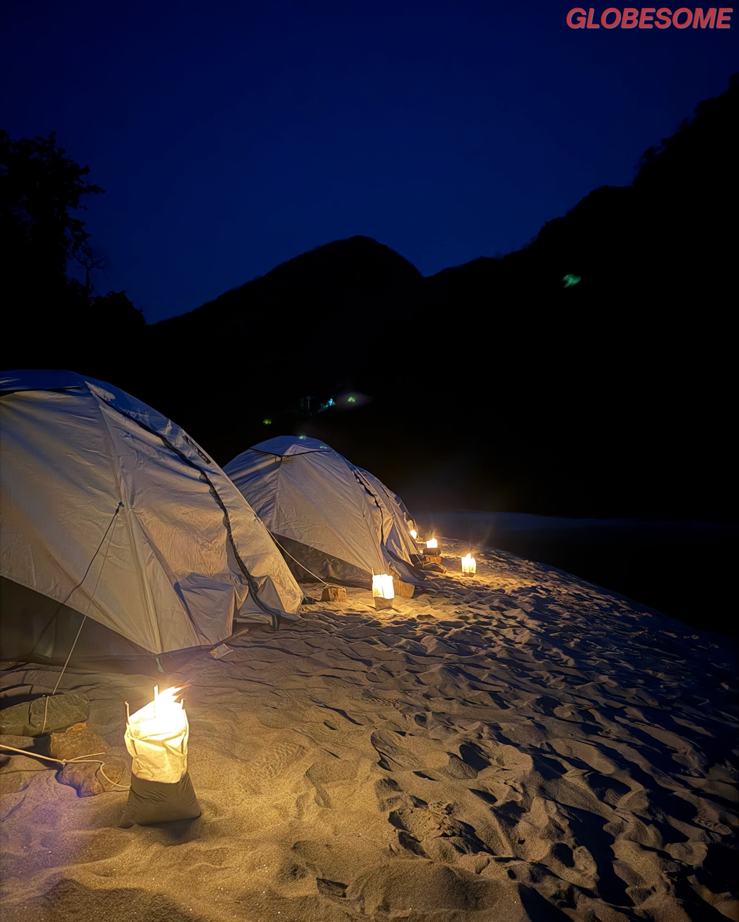 Camp, lantern-lit