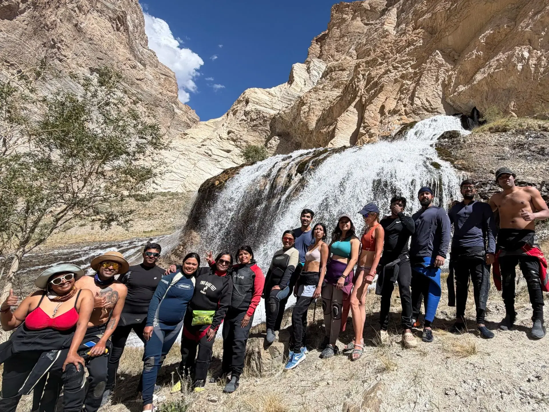 Rishikesh rafting group visiting a Himalayan waterfall