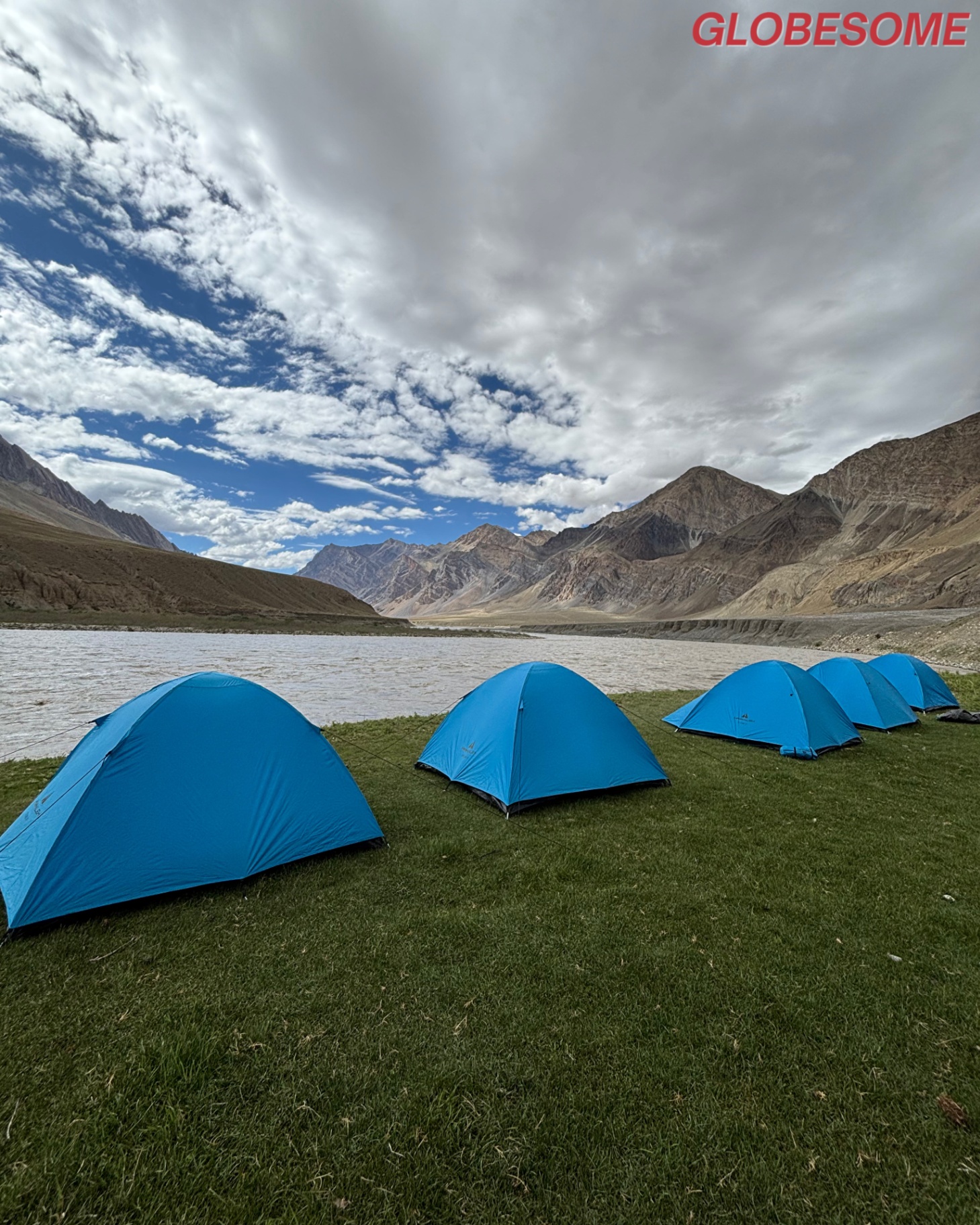 Blue tents lined up on the Zanskar